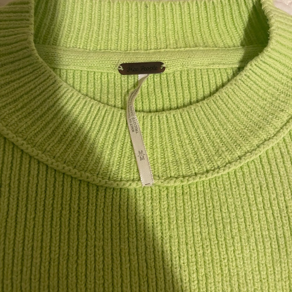 lime green. free people oversized sweater. dry cleaned only. great condition.